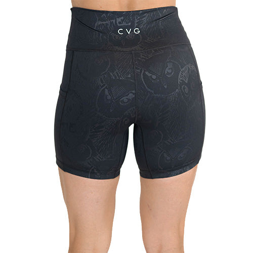 back of black and grey owl print shorts