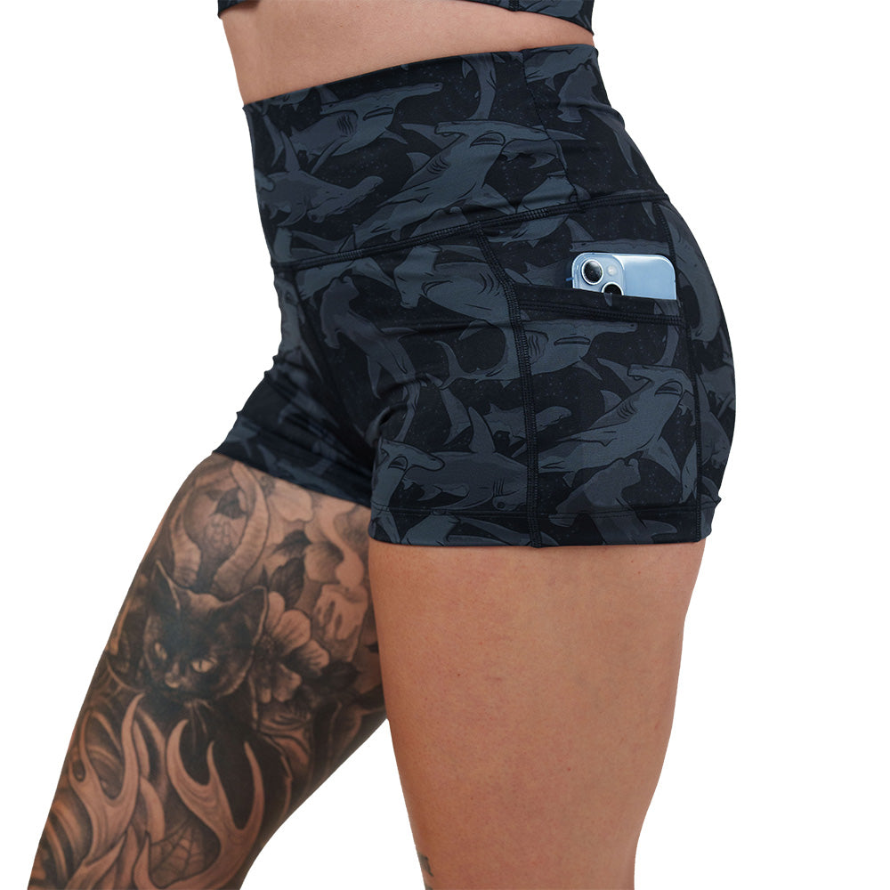 black and grey shark patterned shorts