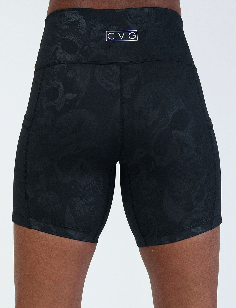 back of the 5 inch black shorts with a dark grey skull pattern against a white background