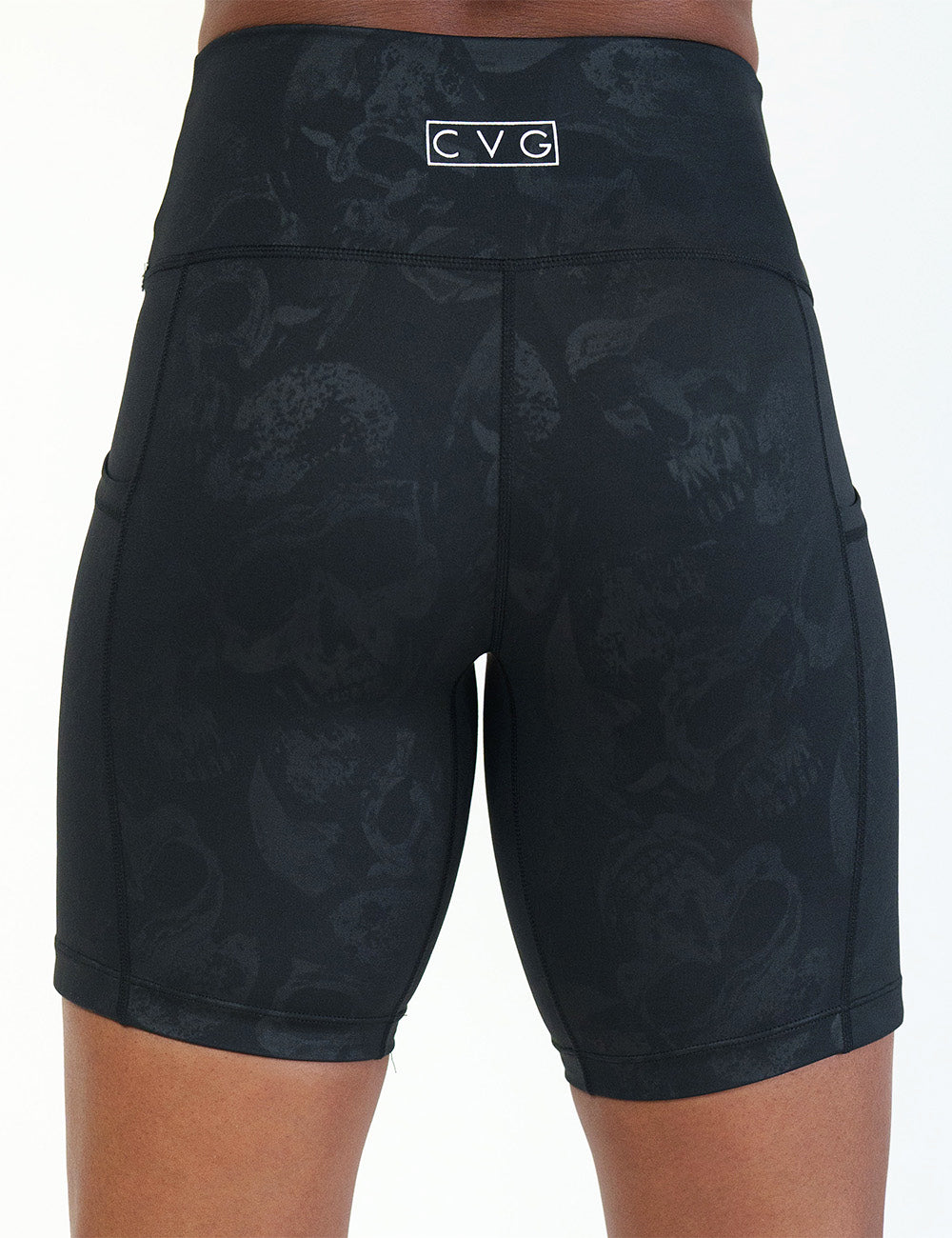 back of the 7 inch black shorts with a dark grey skull pattern against a white background
