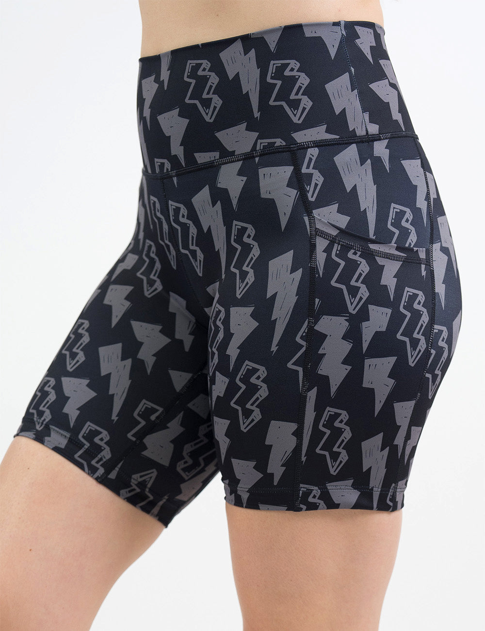front of the 7 inch black shorts with grey lightning bolts against a white background