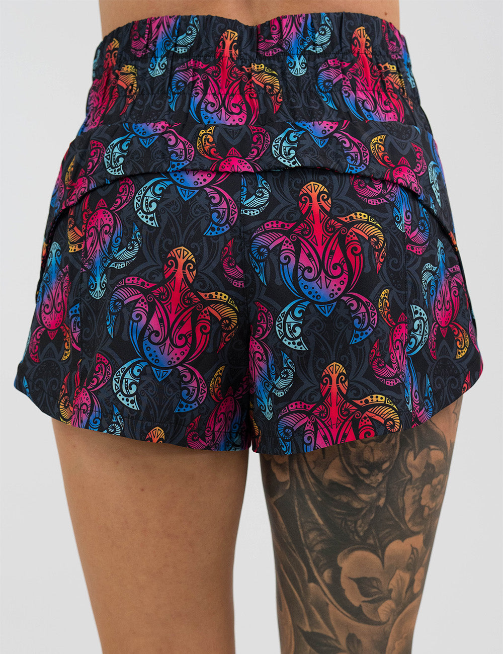 back of the 3.5 inch rainbow turtle day dream shorts against a white background