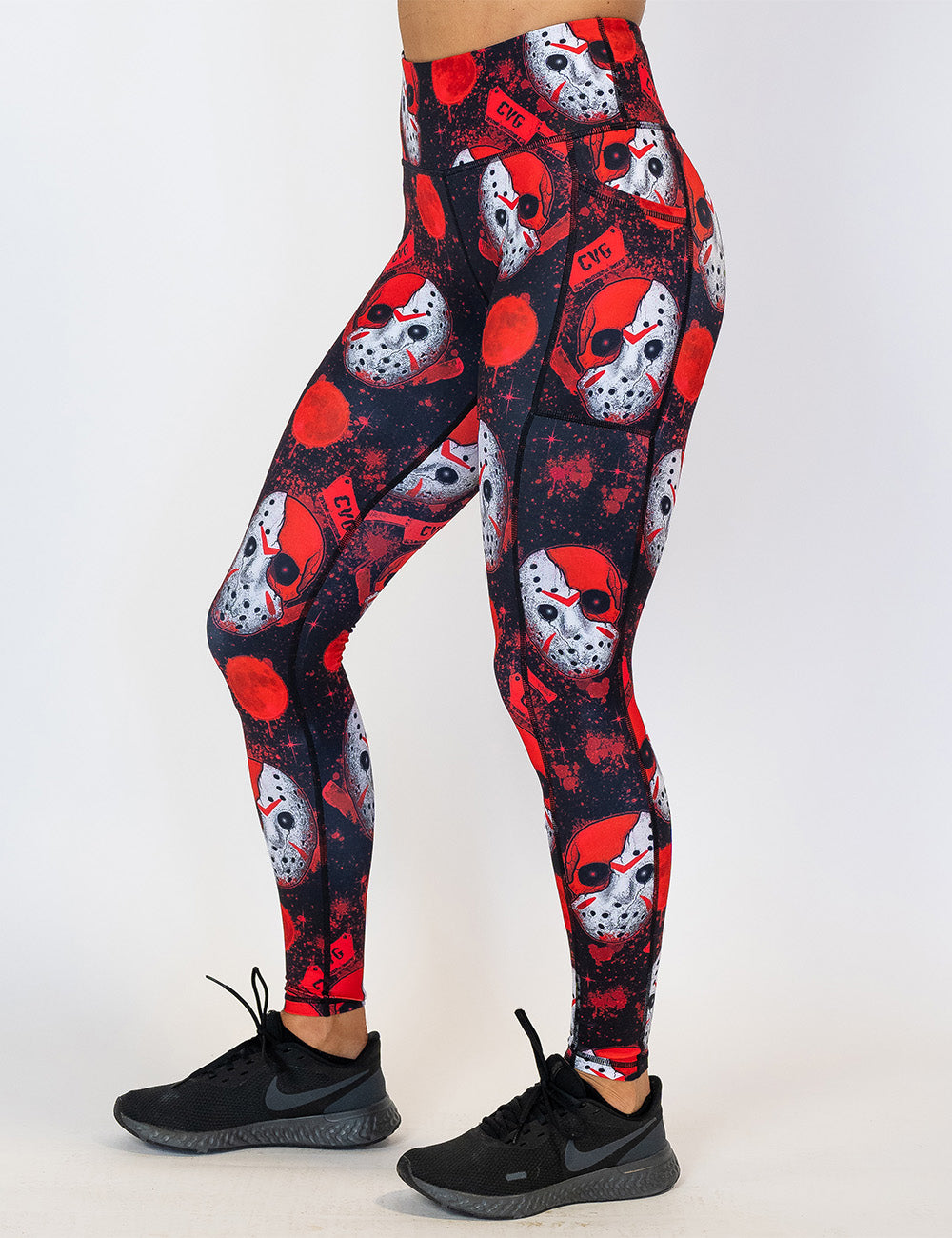 front of the full length bloody hocky mask leggings against a white background