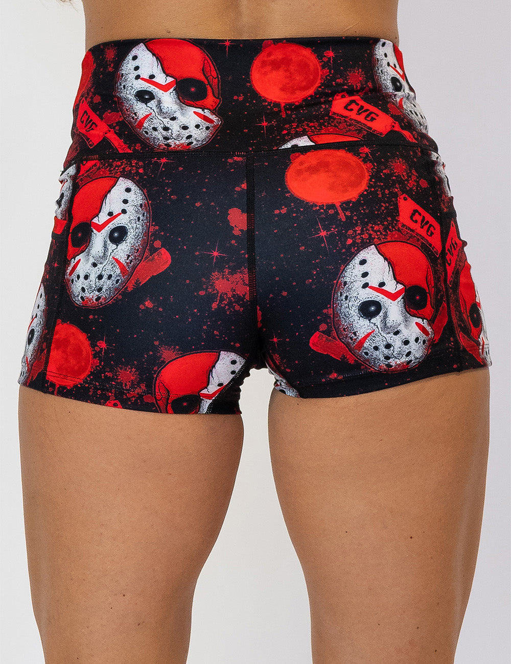back of the 2.5 inch bloody hockey masks with CVG meat cleavers shorts against a white background