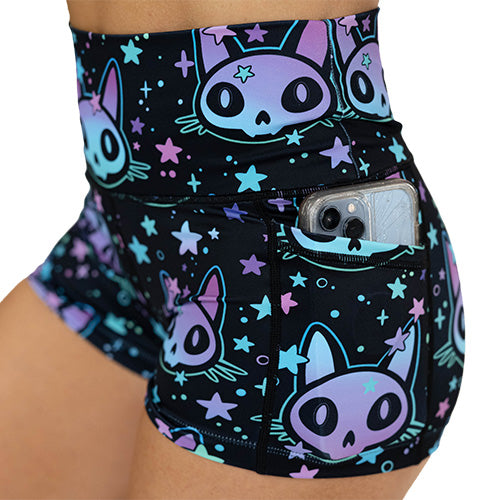 close up of side pocket on the 2.5 inch alien cat with stars showing how easily a phone fits against a white background