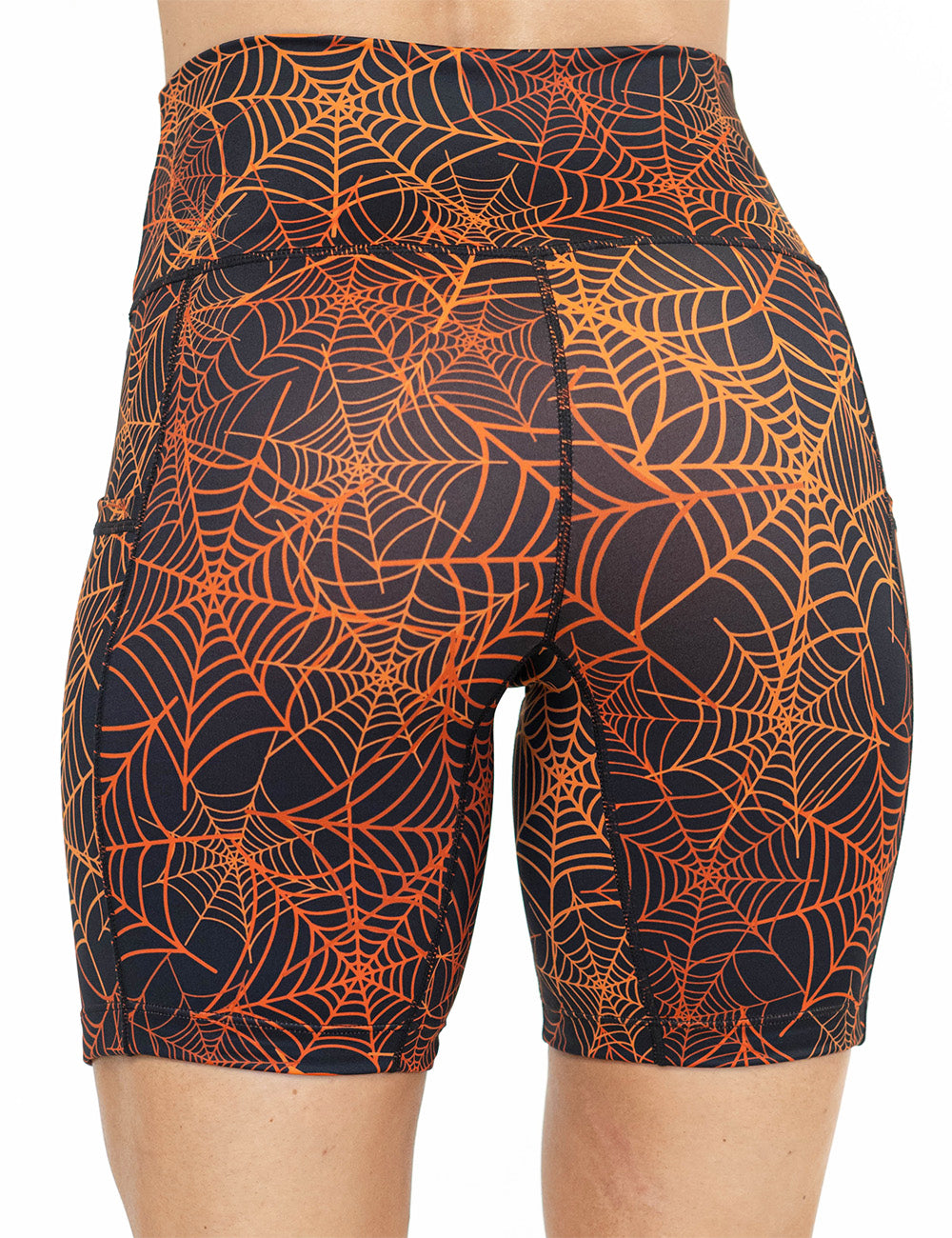 back of the 7 inch orange spider webs against a black background shorts against a white background