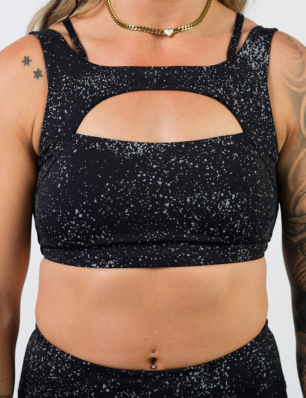 front of the black bra with reflective spots 