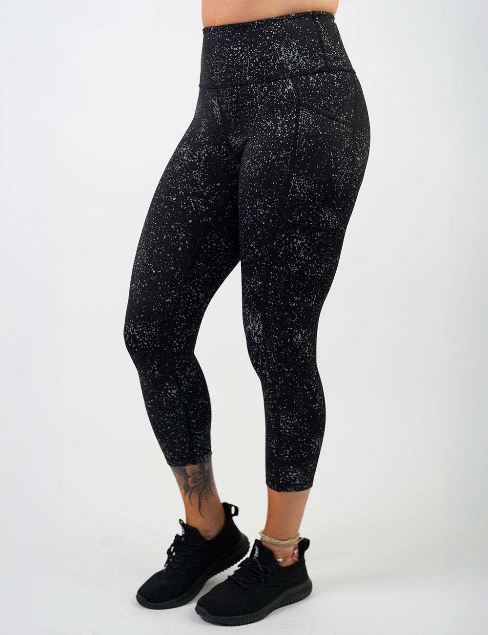 front of the capri black leggings with reflective spots