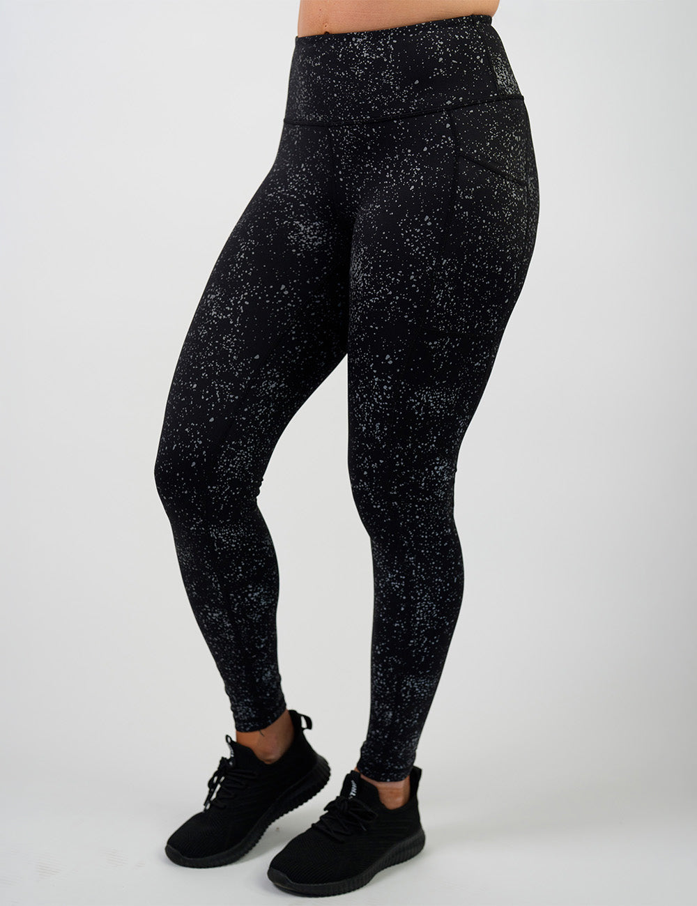 front of the full length black leggings with reflective spots