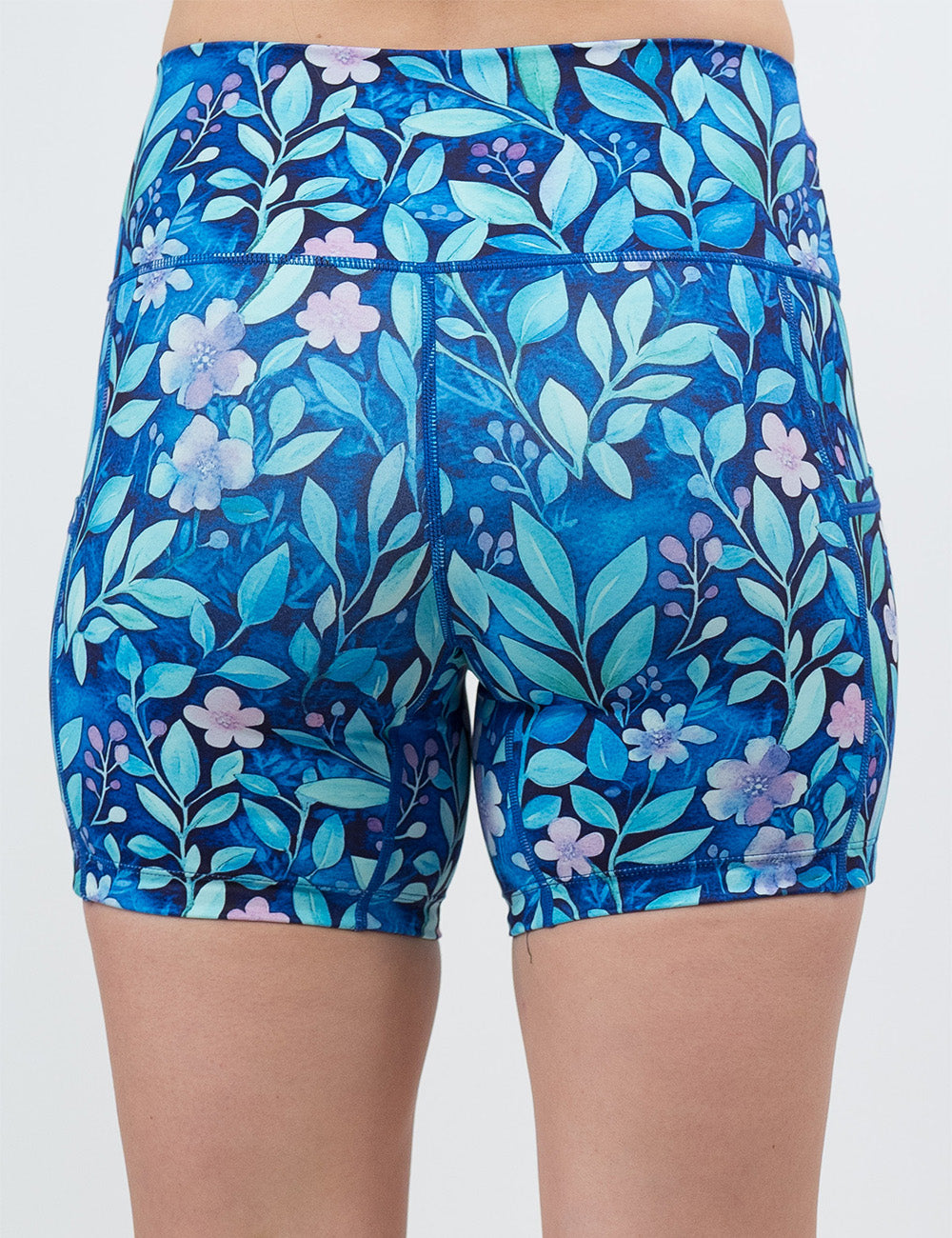 back of the 5 inch blue flower and vine shorts against a white background