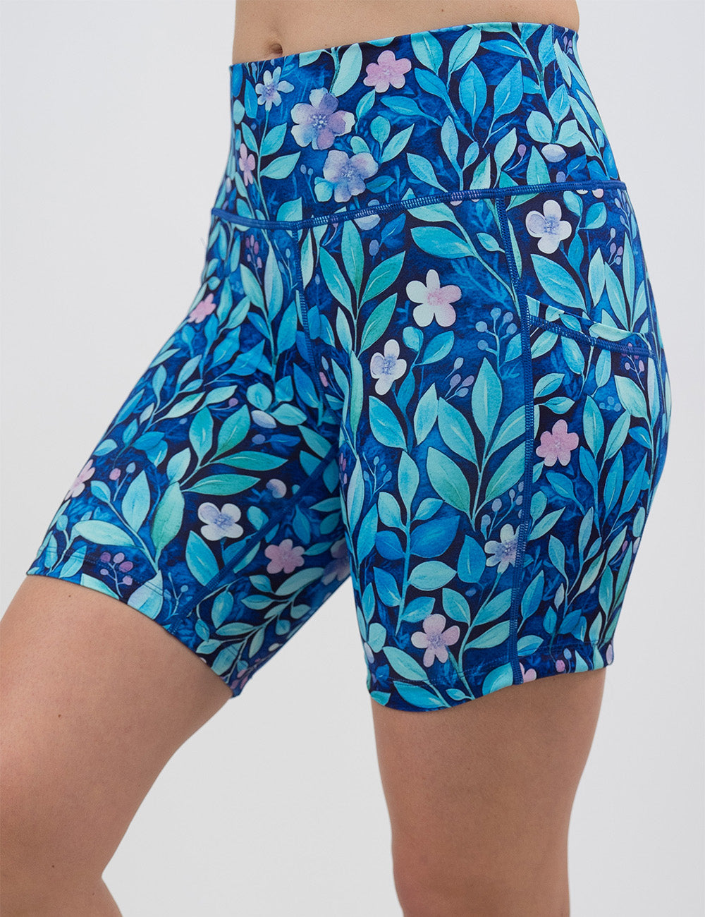 close up of the 7 inch blue flowers and vines shorts facing the front against a white background