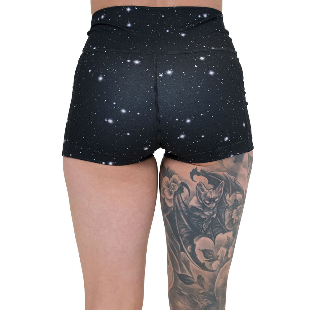 back of the black shorts with a white star pattern on it
