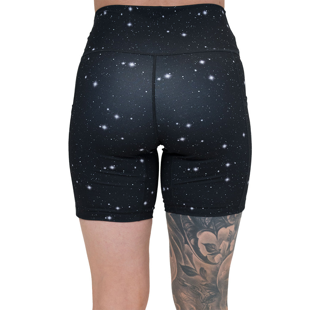 back of the black shorts with a white star pattern on it