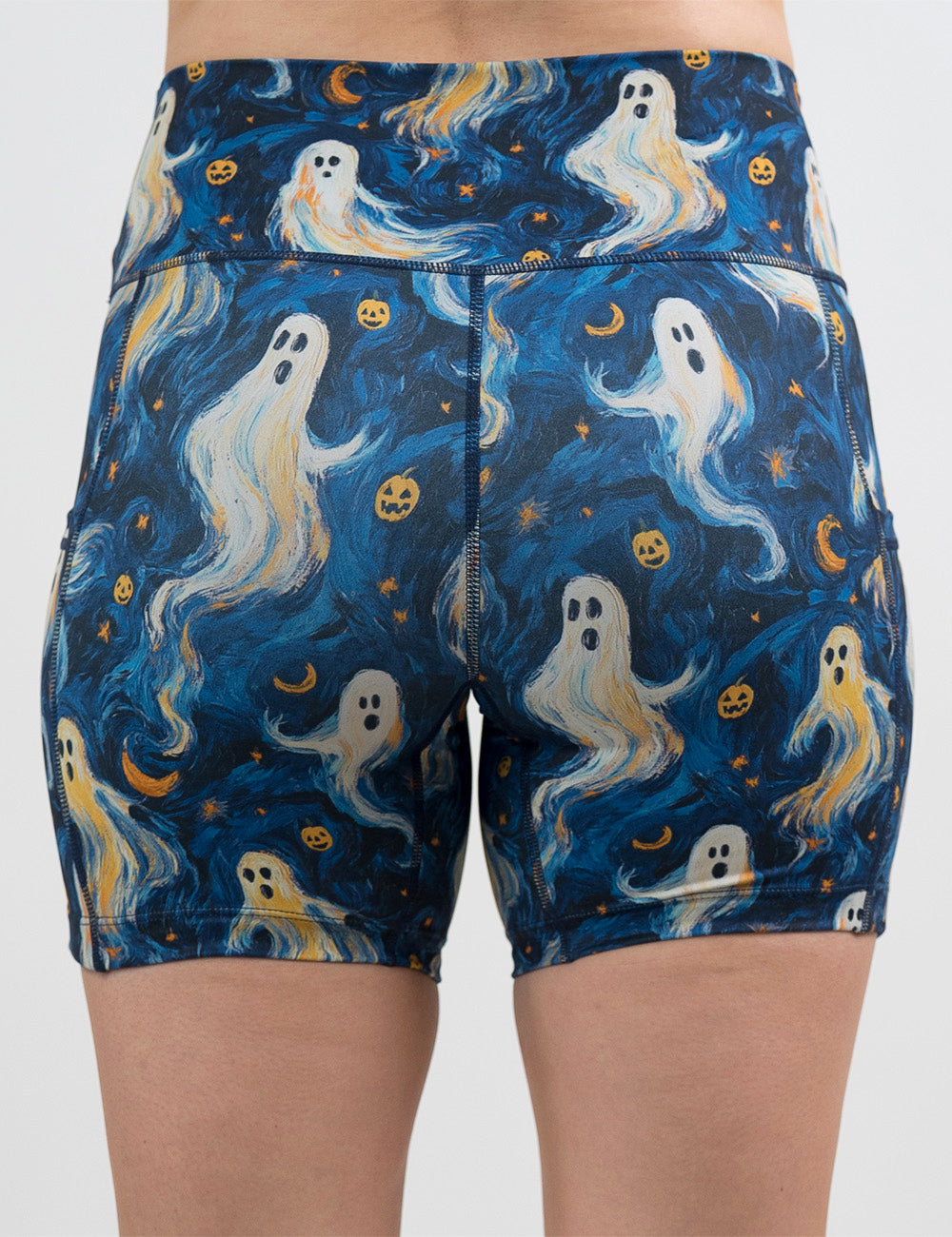back of the 5 inch starry night ghosts against a blue background pattern shorts against a white background