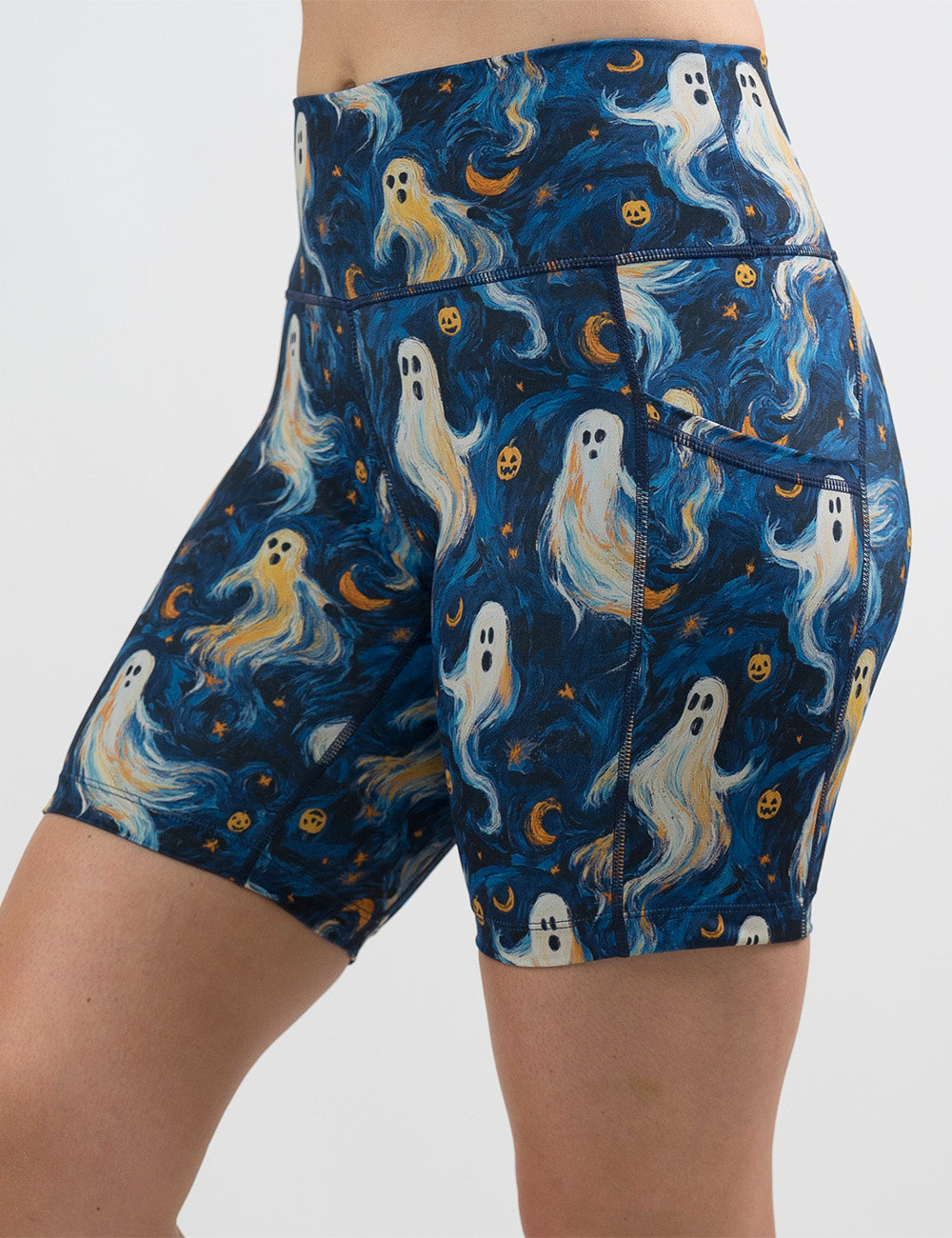 front of the starry night ghosts against a blue background pattern 7 inch shorts against a white background