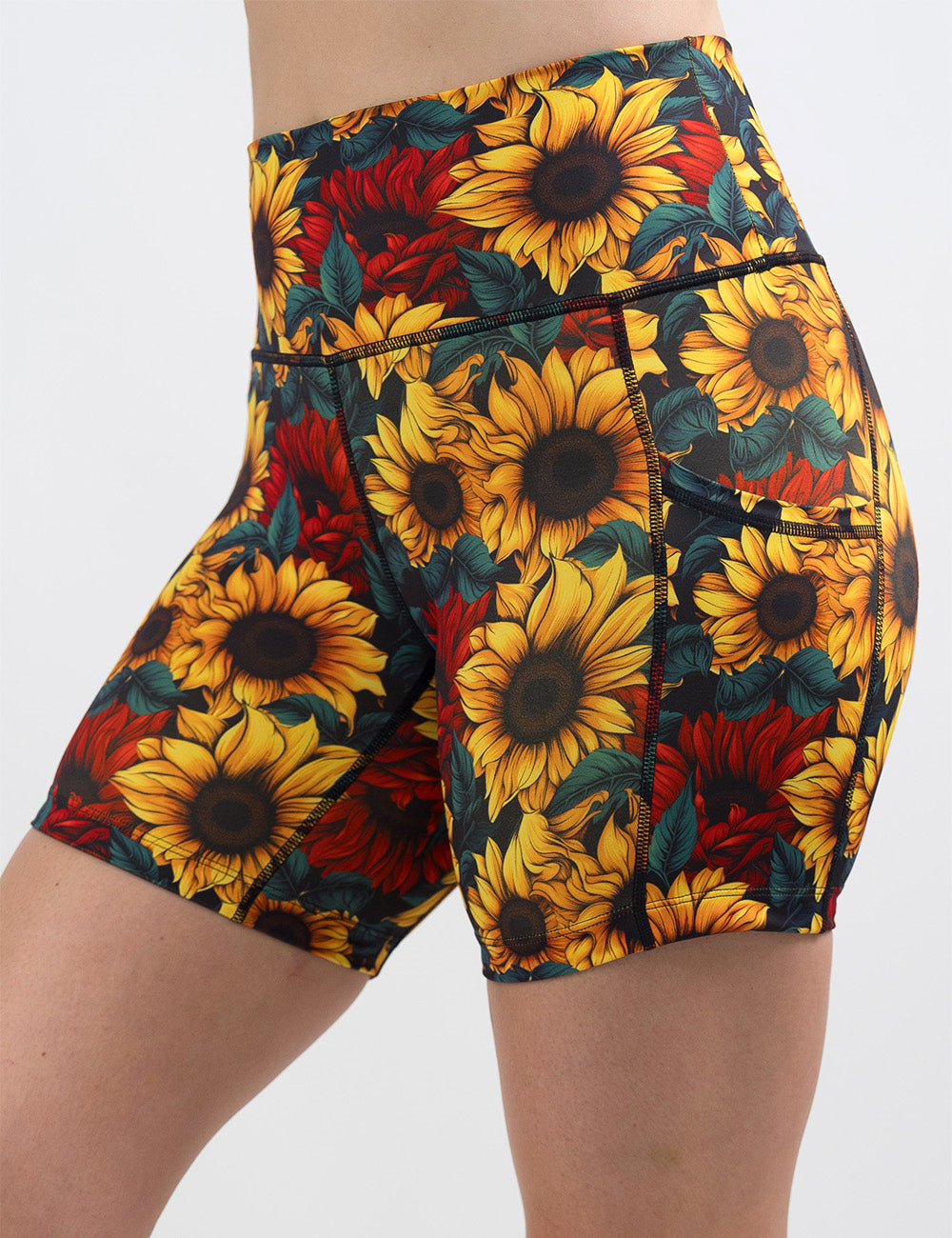 front of the 5 inch sunflower with red flowers shorts against a white background