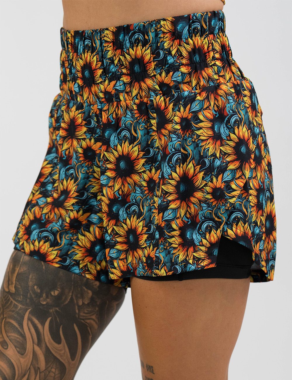 5.5 inch sunflower day dream shorts facing the front against a white background