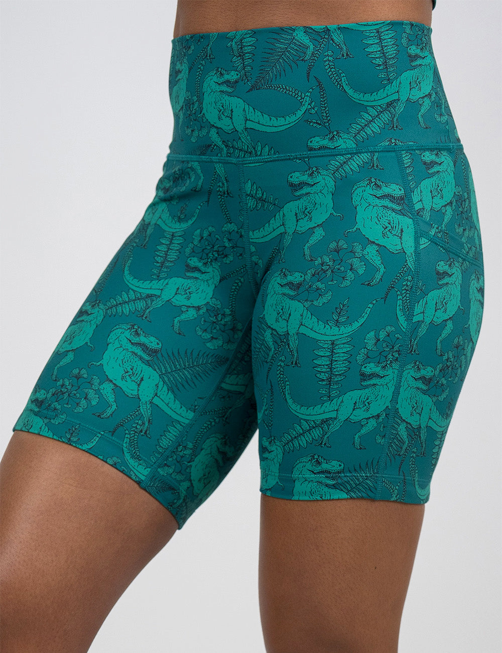 front of the 7 inch teal t-rex shorts against a white background
