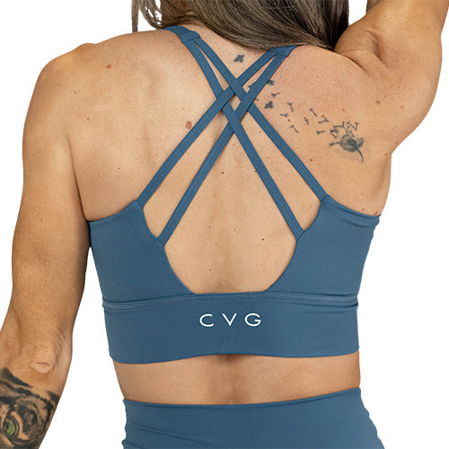 back of solid blue sports bra
