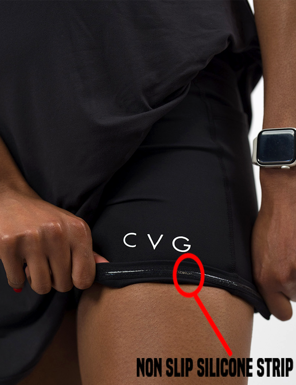 black activewear dress shorts lining being rolled up to showcase the non slip silicone strip lining