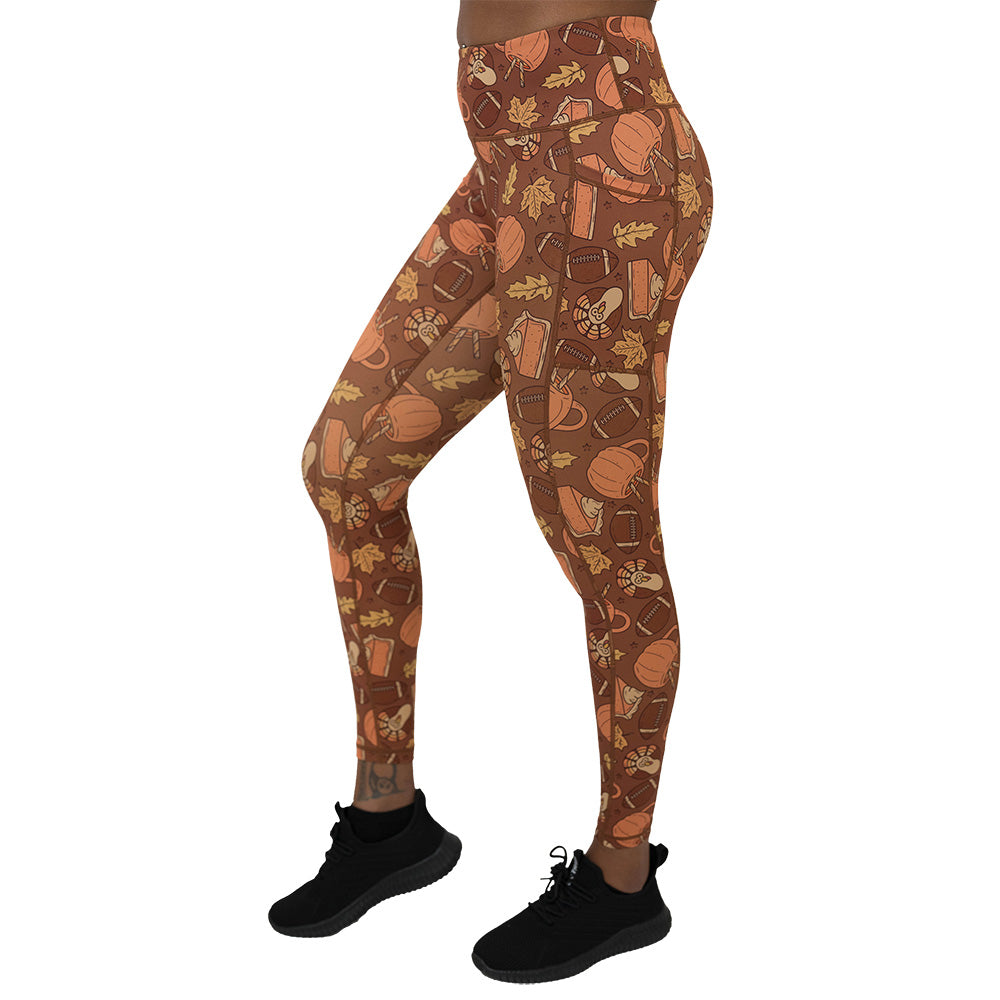 leggings with pumpkins, leaves, and football