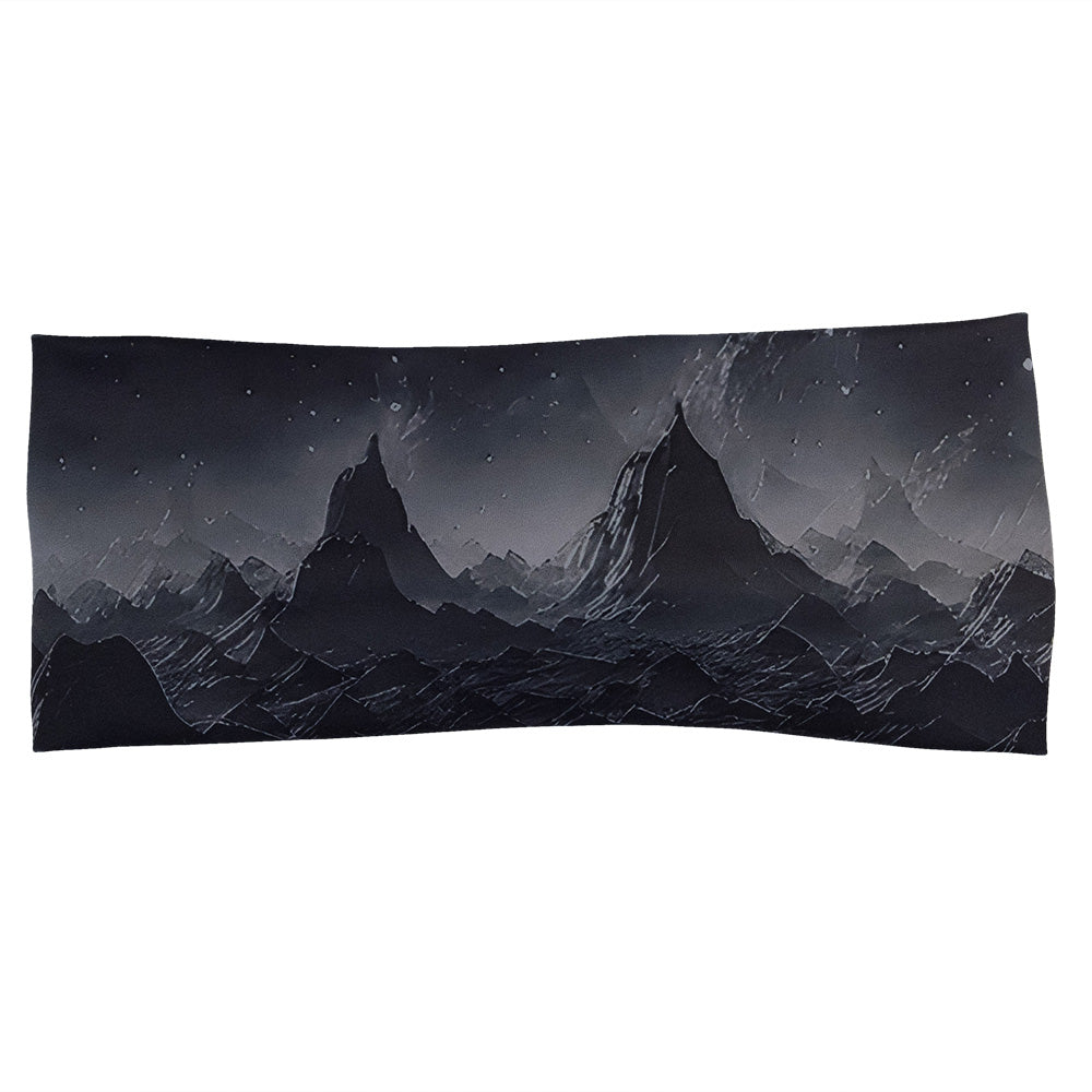 front of the black headband with a mountain and star pattern against a white background