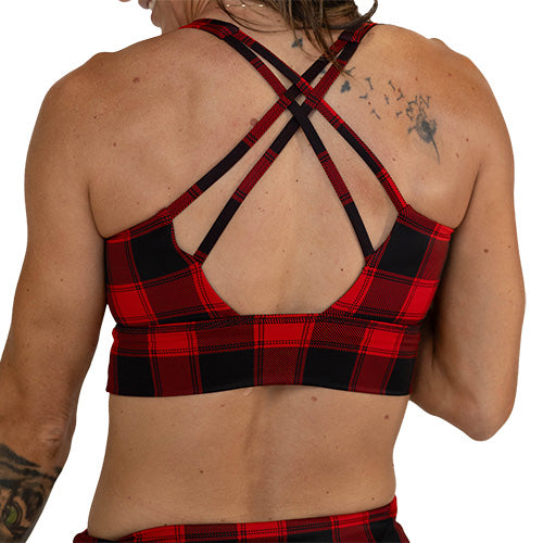 back view of red and black plaid sports bra