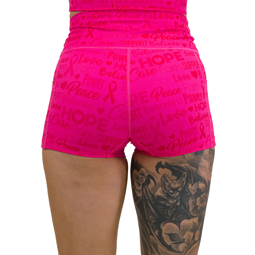 back of the Pink shorts with motivational text and breast cancer awareness ribbons