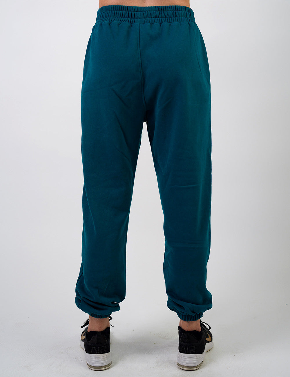 back of the dark blue sweatpants