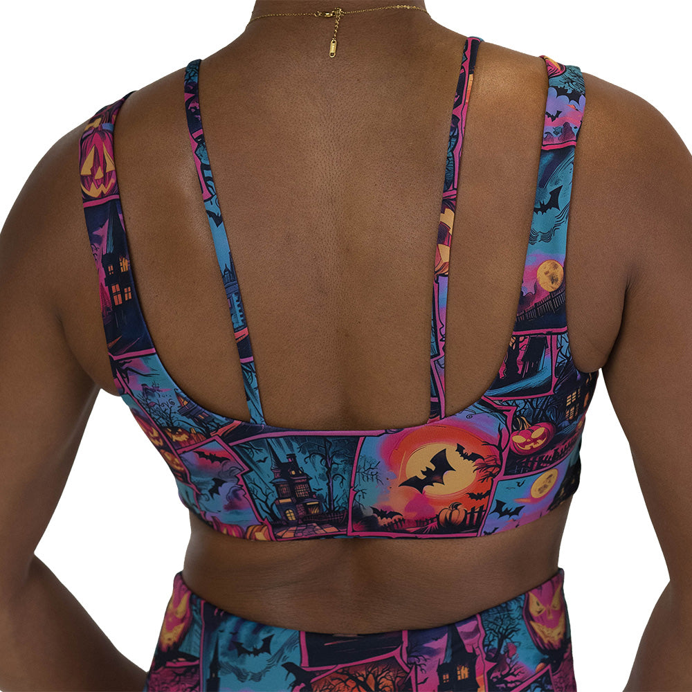 back of the colorful Halloween-themed sports bra
