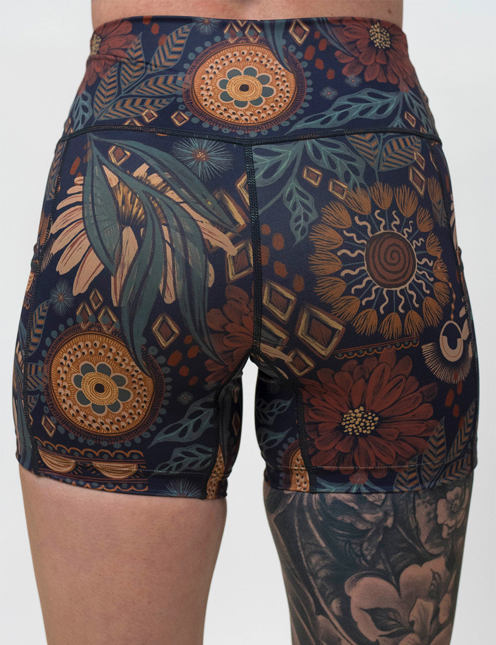 back of the 5 inch paisley flowers shorts against a white background