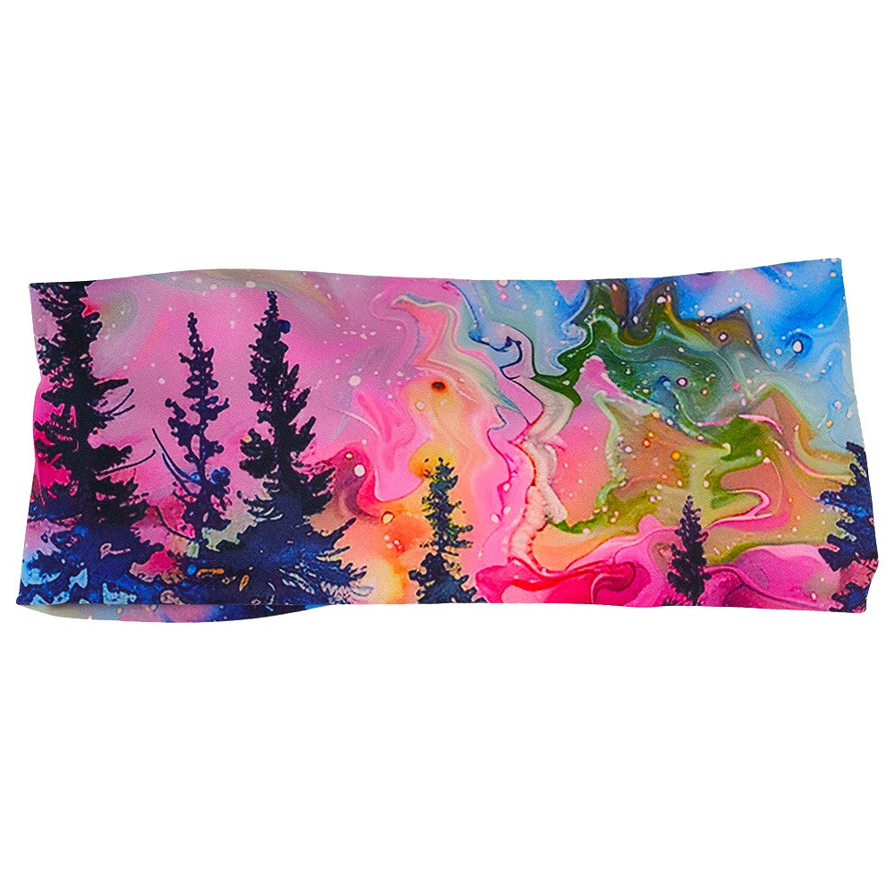 front of the watercolor rainbow patterned forest against a white background