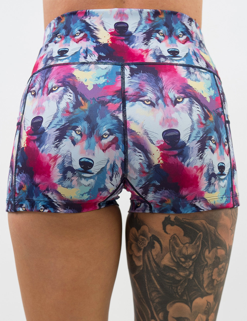 back of the 2.5 inch red, white, blue, and yellow wolves shorts against a white background