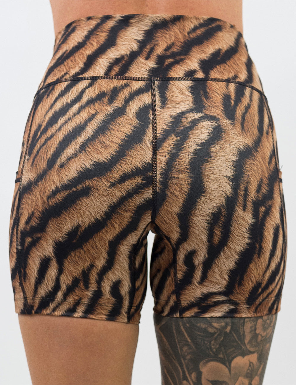 back of the 5 inch tiger print shorts against a white background