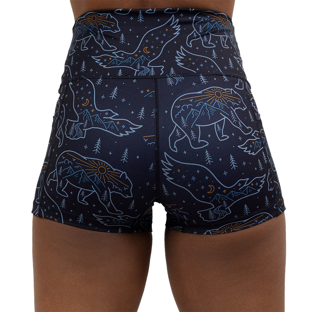 back of the bird and bear outlines against a dark background 2.5 inch shorts against a white background