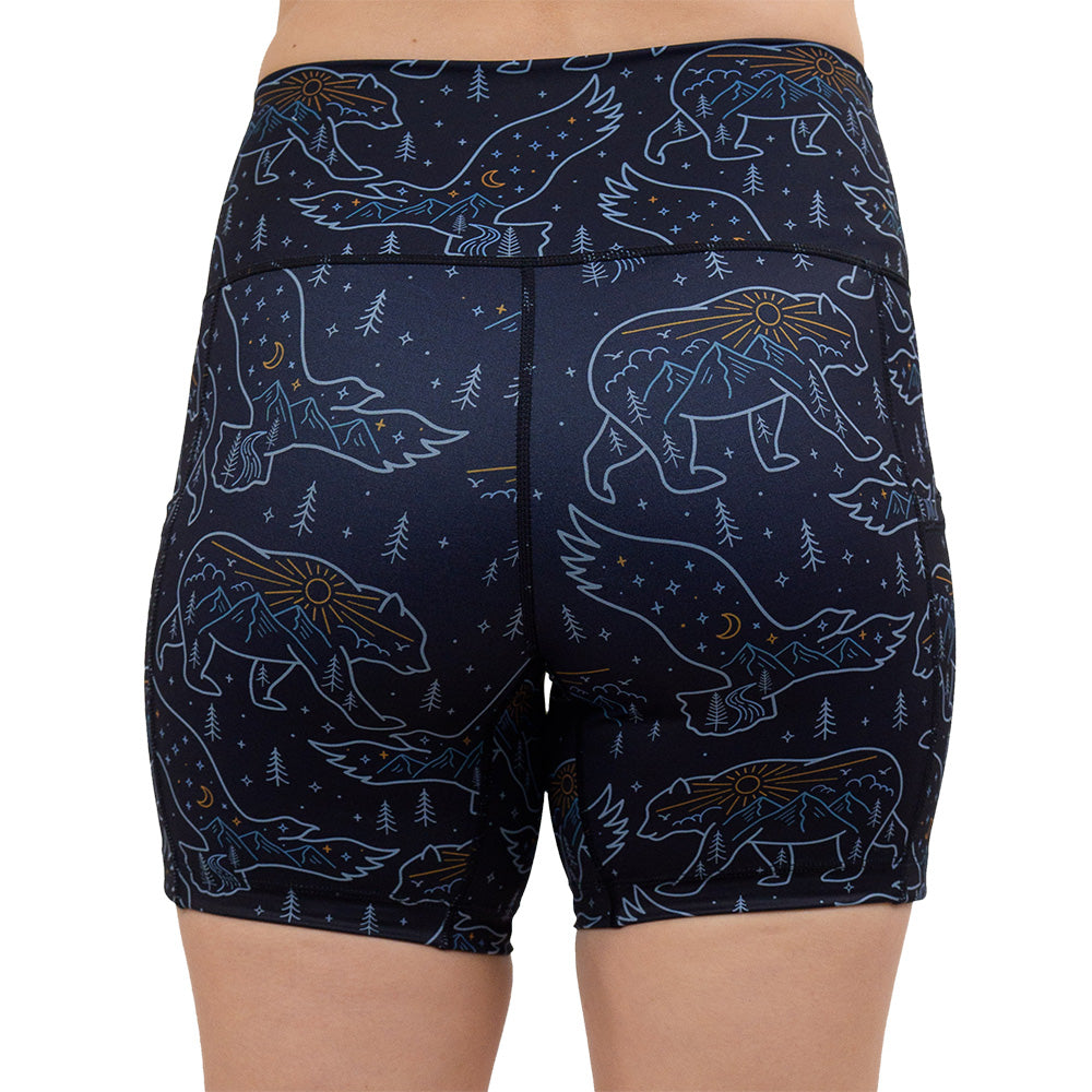 back of the 5 inch bird and bear outlines against a dark background short against a white background