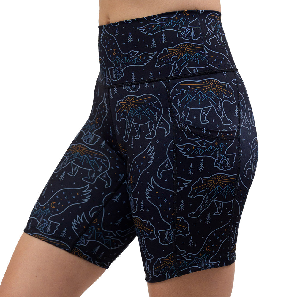 bird and bear outlines against a dark background 7 inch shorts against a white background facing the front