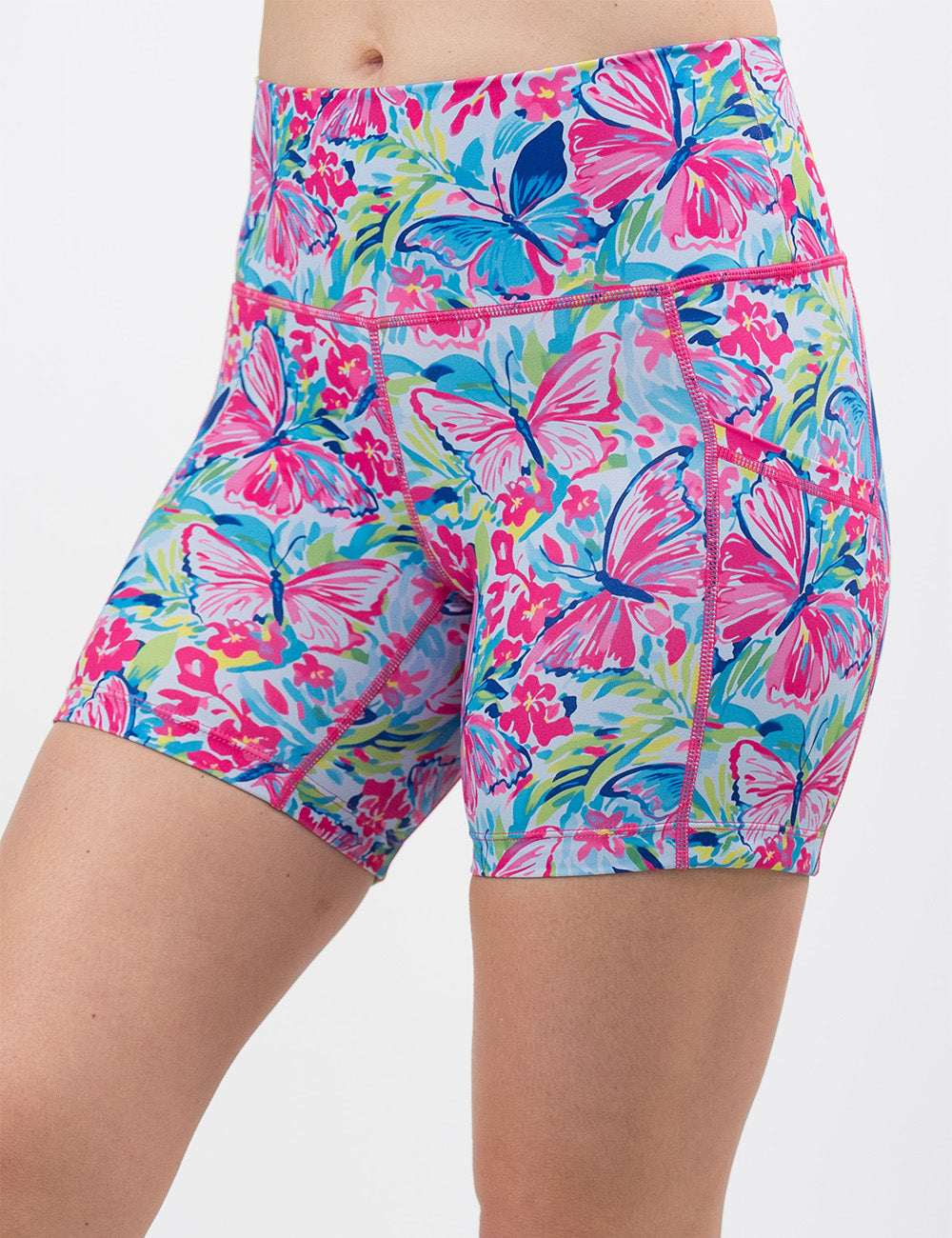 front of the 5 inch pink butterflies against a colorful floral background shorts facing the front against a white background
