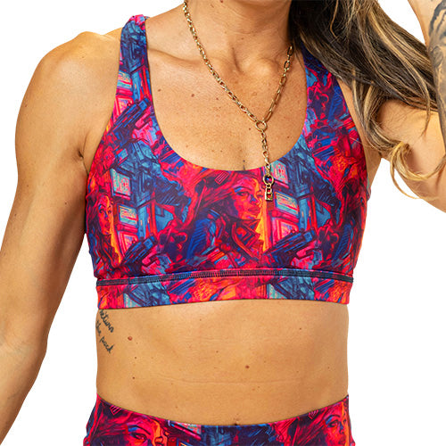 front of colorful bounty huntress patterned sports bra