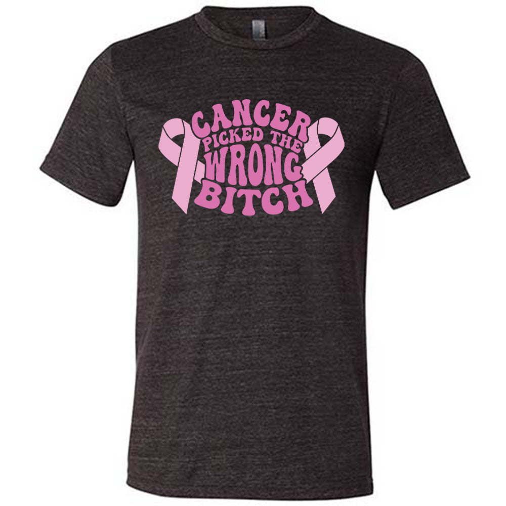 Black t-shirt with pink breast cancer ribbon and text "Cancer Picked The Wrong Bitch" on a white background
