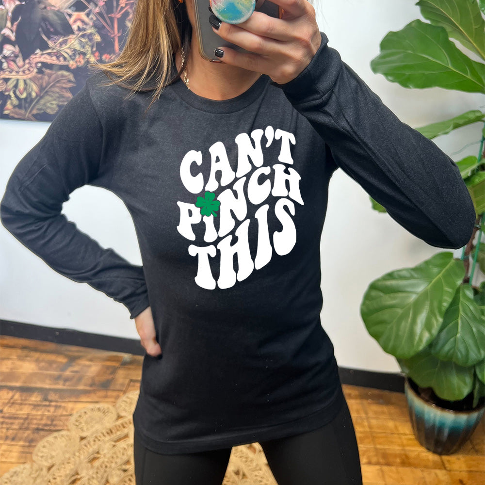 heather black long sleeve with the words "can't pinch this" with a clover above the "i" of "pinch"