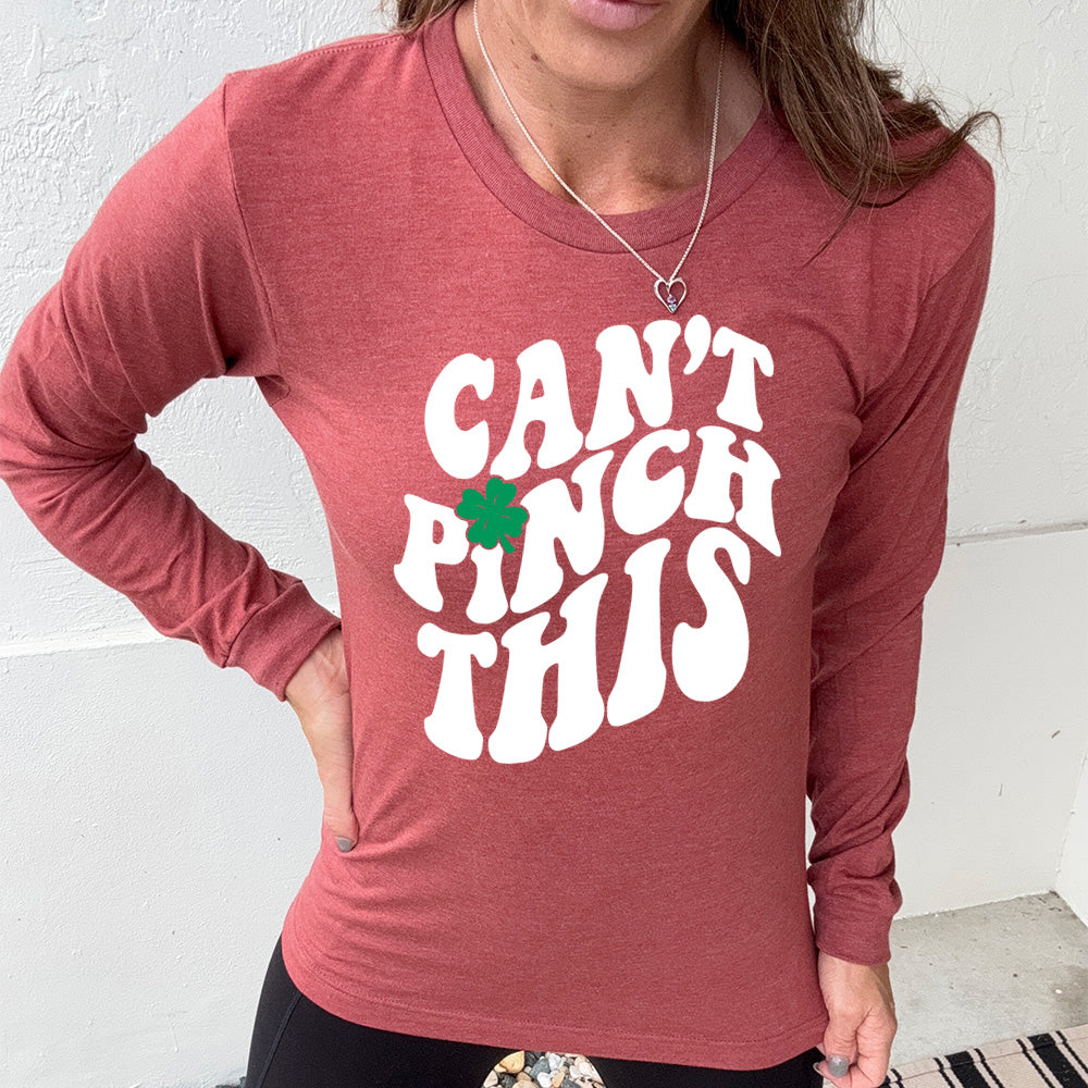 heather clay long sleeve with the words "can't pinch this" with a clover above the "i" of "pinch"