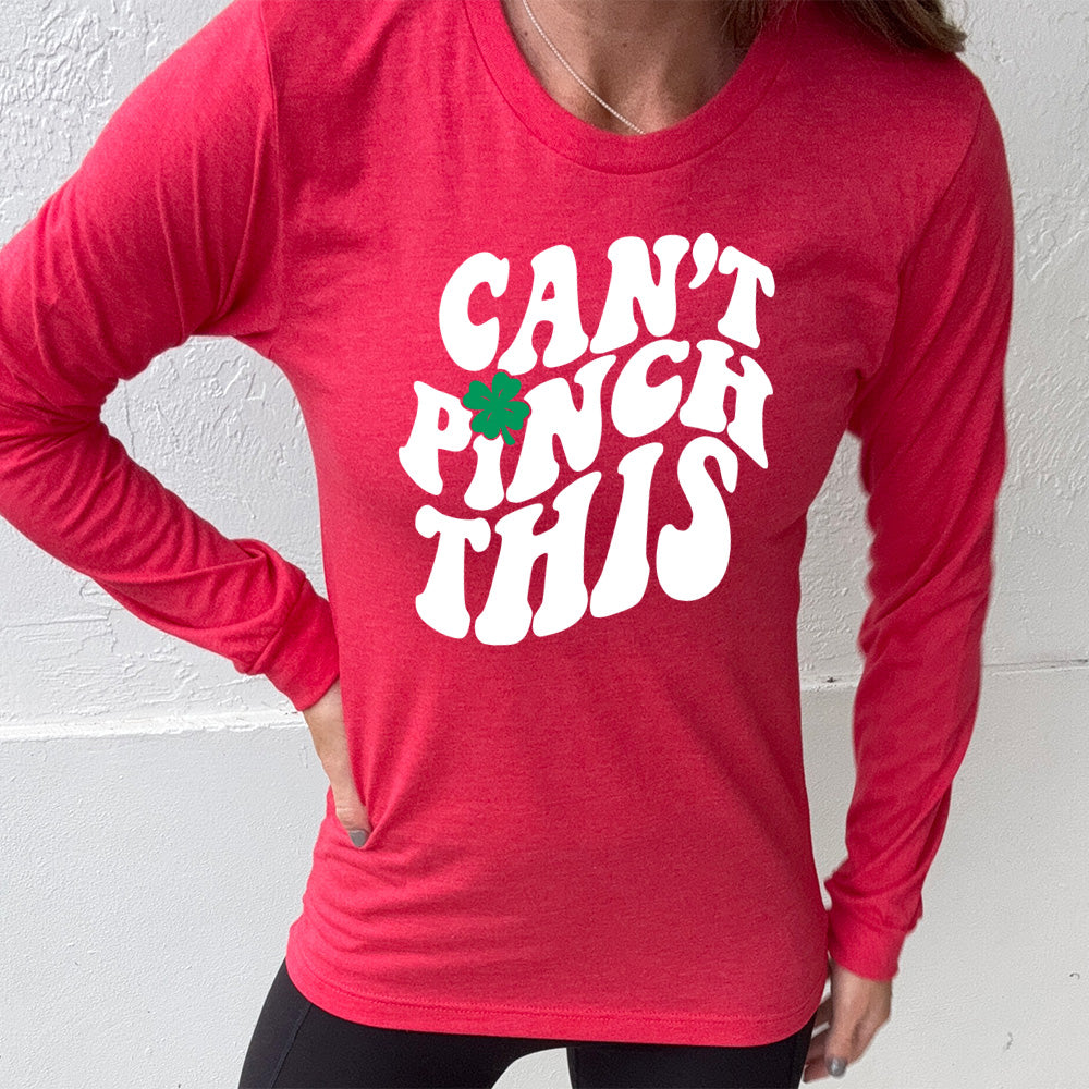 heather red long sleeve with the words "can't pinch this" with a clover above the "i" of "pinch"