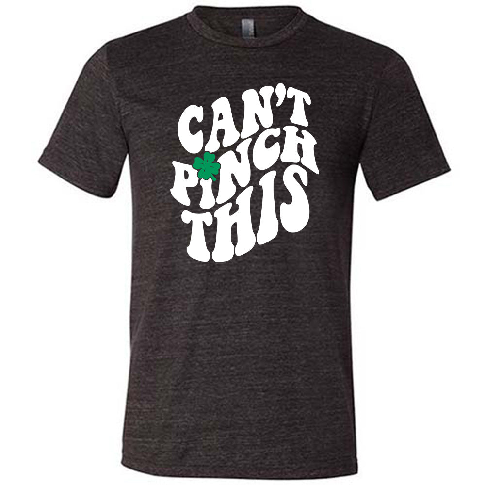 black unisex tee with the words "can't pinch this" with a clover above the "i" of "pinch"
