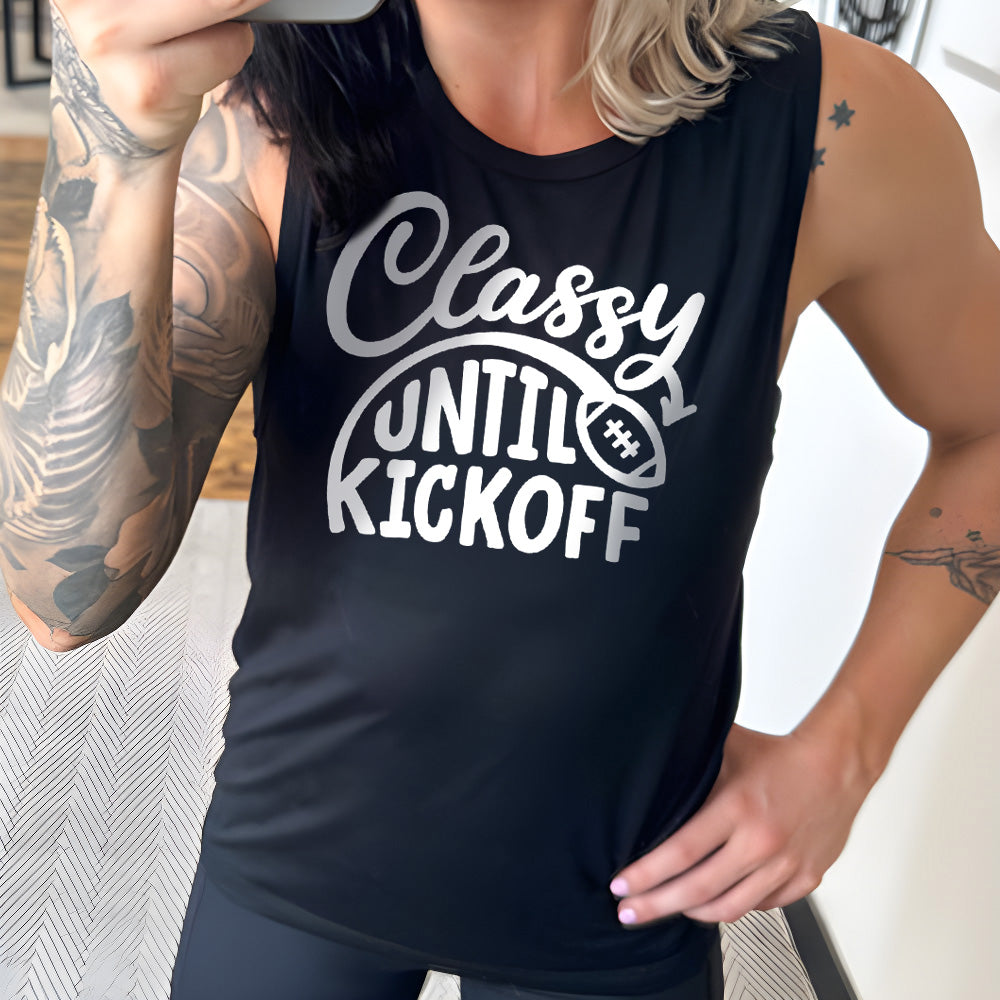 Model wearing black colored muscle tank with football graphic on it that says "Classy Until Kickoff"