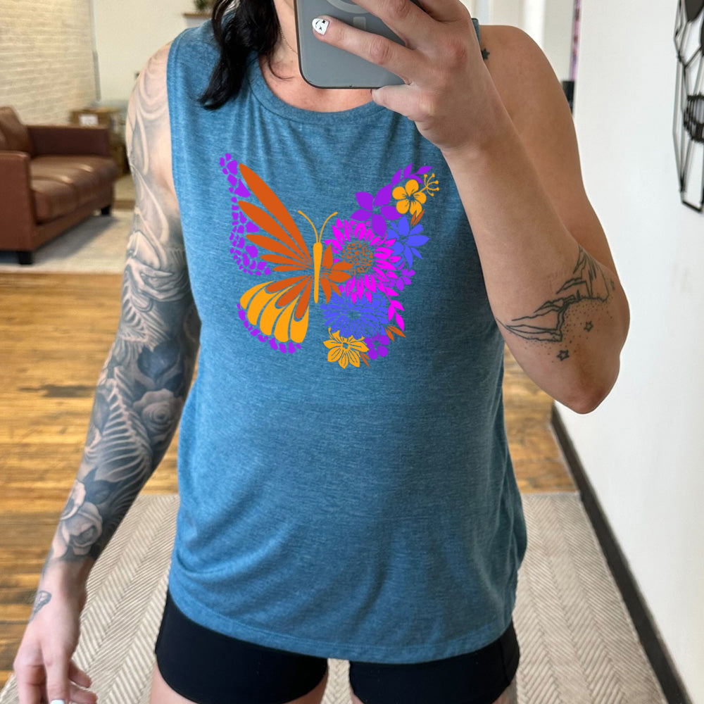 deep teal muscle tank with a floral butterfly graphic on it