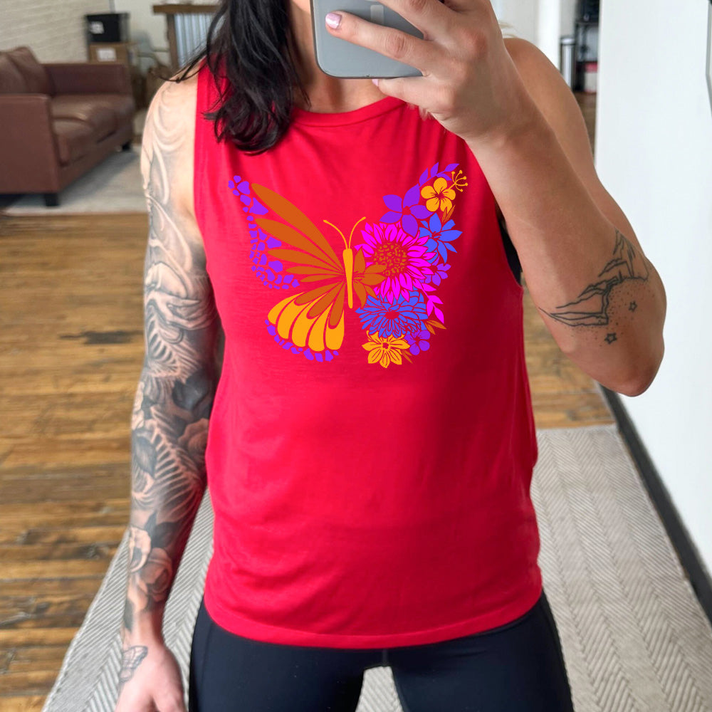 Red colored muscle tank with a floral butterfly graphic on it