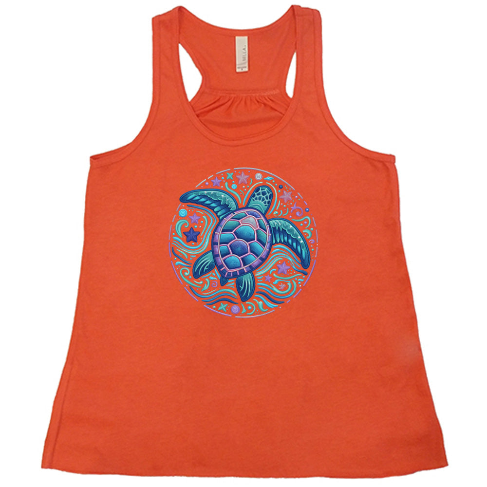 Coral colored flowy tank with a colorful turtle graphic on it