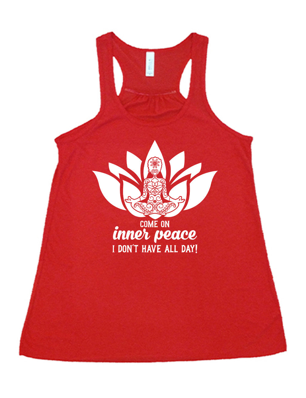 red flowy racerback tank with the graphic of a patterned person's silhouette doing a seated yoga pose, sitting in a lotus shape, with the words underneath saying "come on inner peace I don't have all day!