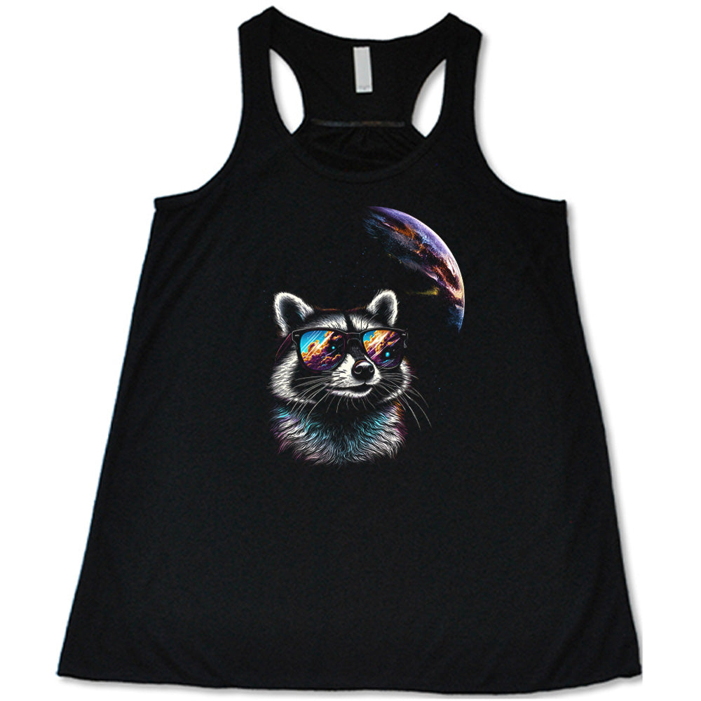 Black colored flowy tank with a raccoon looking into space graphic on it